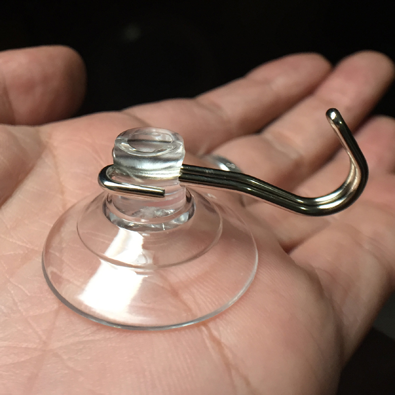 small suction cup with hooks
